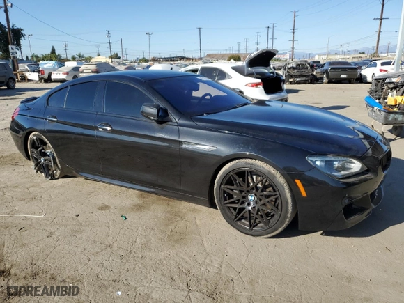 2015 BMW 6 Series 640i with VIN WBA6A0C53FD318076, listed as a Copart auction lot 78717324 with 97,664 mi miles and Salvage Title. Bid and sale history available at carsss.com. Image 4.