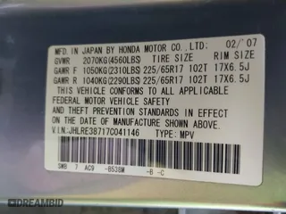 2007 Honda CR-V EX-L with VIN JHLRE38717C041146, listed as a IAAI auction lot 41799778 with 217,261 mi miles. Bid and sale history available at carsss.com. Image 9.