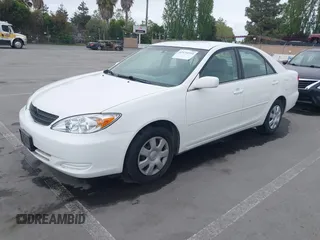 2004 Toyota Camry LE with VIN 4T1BE32K84U362436, listed as a IAAI auction lot 42134510 with 199,371 mi miles. Bid and sale history available at carsss.com. Image 2.