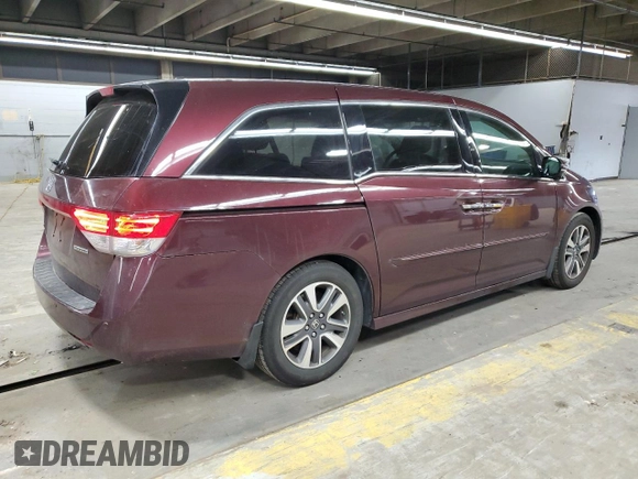 2014 Honda Odyssey Touring with VIN 5FNRL5H93EB079817, listed as a Copart auction lot 56231645 with 65,521 mi miles and Salvage title. Bid and sale history available at DreamBid. Image 3.