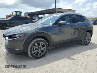 2024 Mazda CX-30 S Premium with VIN 3MVDMBDM4RM615609, listed as a Copart auction lot 57761055 with 20,721 mi miles and Salvage title. Bid and sale history available at DreamBid. Image 1.