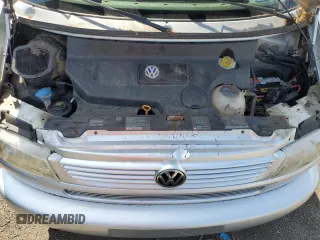 2003 Volkswagen EuroVan MV с VIN WV2MB47023H044047, выставлен на аукционе Copart как лот 71014624 с пробегом 189 485 миль миль и Чистый • Clean title. История ставок и продаж доступна на DreamBid. Изображение 12.