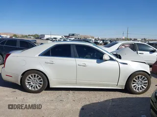 2013 Cadillac CTS Luxury with VIN 1G6DF5E51D0165324, listed as a IAAI auction lot 42099692 with 163,758 mi miles and . Bid and sale history available at DreamBid. Image 13.