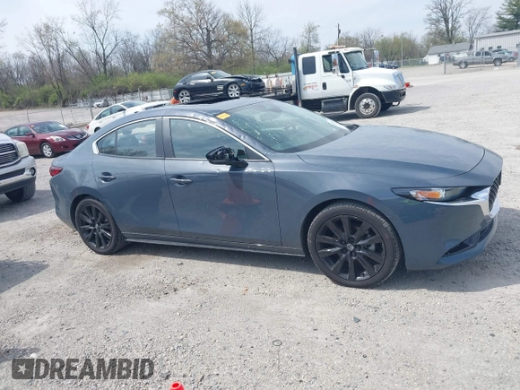 2024 Mazda 3 S Carbon Edition with VIN 3MZBPBCM3RM416565, listed as a IAAI auction lot 42047841 with 11,074 mi miles and . Bid and sale history available at DreamBid. Image 13.
