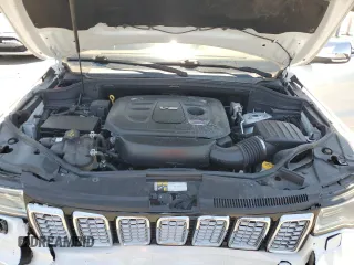 2018 Jeep Grand Cherokee Summit with VIN 1C4RJEJG9JC212554, listed as a Copart auction lot 63123065 with 82,976 mi miles and Salvage title. Bid and sale history available at DreamBid. Image 12.