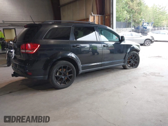 2013 Dodge Journey SXT with VIN 3C4PDDBG0DT660956, listed as a IAAI auction lot 41593385 with 196,021 mi miles and . Bid and sale history available at DreamBid. Image 4.