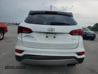 2018 Hyundai Santa Fe 2.4L with VIN 5NMZT3LB2JH056889, listed as a Copart auction lot 57801705 with 133,454 mi miles and Salvage title. Bid and sale history available at DreamBid. Image 6.