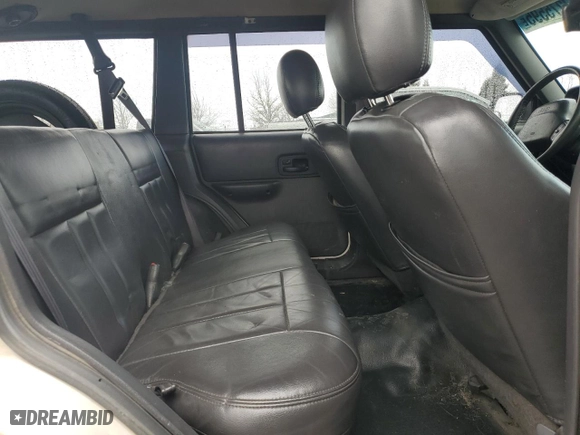2001 Jeep Cherokee Sport with VIN 1J4FF48S61L585814, listed as a Copart auction lot 47275595 with 334,907 mi miles and Salvage Title. Bid and sale history available at carsss.com. Image 11.