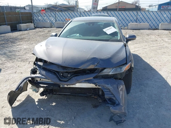 2019 Toyota Camry LE with VIN 4T1B11HK9KU810347, listed as a IAAI auction lot 41804007 with 75,063 mi miles and . Bid and sale history available at DreamBid. Image 13.