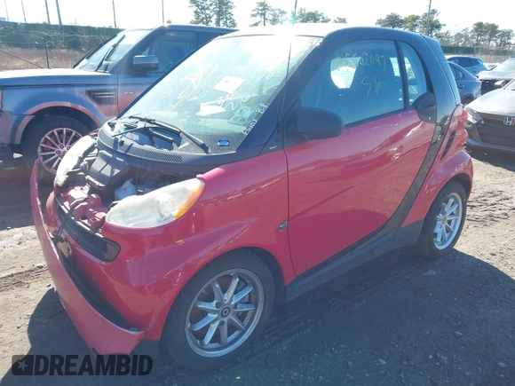 2009 Smart fortwo Pure with VIN WMEEJ31X29K305678, listed as a IAAI auction lot 41691476 with Not Provided miles and . Bid and sale history available at DreamBid. Image 2.