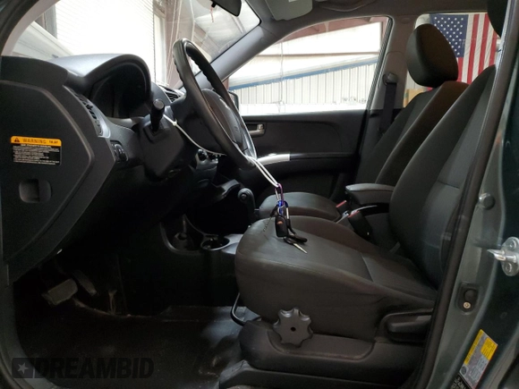 2009 Kia Sportage LX with VIN KNDJE723X97561560, listed as a Copart auction lot 49766995 with 130,623 mi miles and Salvage Title. Bid and sale history available at DreamBid. Image 7.