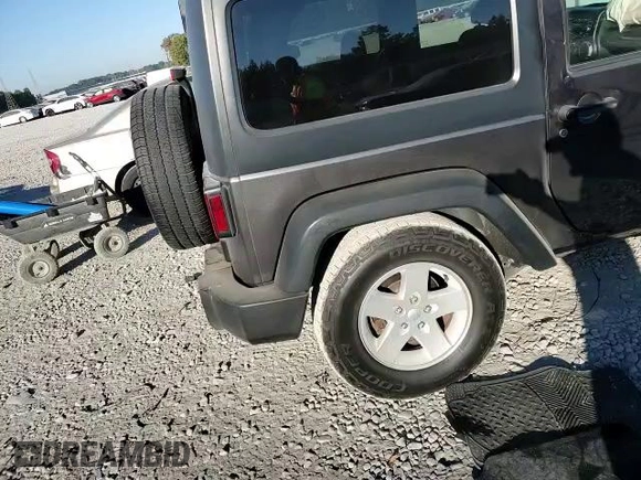 2017 Jeep Wrangler Willys Wheeler with VIN 1C4AJWAG6HL521623, listed as a Copart auction lot 61373722 with Not Provided miles and Salvage Title. Bid and sale history available at DreamBid. Image 11.