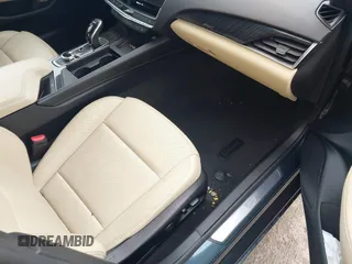 2020 Cadillac CT5 Premium Luxury with VIN 1G6DT5RK7L0141035, listed as a IAAI auction lot 41849703 with 52,712 mi miles and . Bid and sale history available at DreamBid. Image 5.