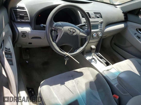 2010 Toyota Camry with VIN 4T1BF3EK1AU054044, listed as a Copart auction lot 54878685 with 167,452 mi miles and Salvage Title. Bid and sale history available at DreamBid. Image 8.