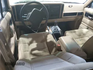 1996 Jeep Cherokee Sport with VIN 1J4FJ68S8TL282160, listed as a Copart auction lot 70670014 with 217,003 mi miles and Clean Title. Bid and sale history available at carsss.com. Image 8.