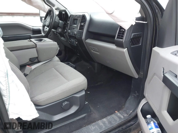 2018 Ford F-150 XL with VIN 1FTEW1EB0JKD85702, listed as a IAAI auction lot 41207356 with 136,528 mi miles. Bid and sale history available at carsss.com. Image 5.