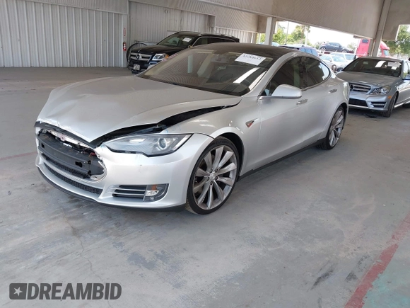 2013 Tesla Model S Performance with VIN 5YJSA1DP6DFP07999, listed as a IAAI auction lot 42284612 with 123,261 mi miles and . Bid and sale history available at DreamBid. Image 2.