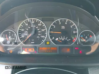 2005 BMW 3 Series 330i with VIN WBAEV53445KM41495, listed as a IAAI auction lot 41659065 with 164,868 mi miles. Bid and sale history available at carsss.com. Image 7.