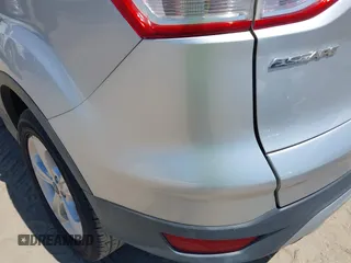 2016 Ford Escape SE with VIN 1FMCU0G71GUA90648, listed as a IAAI auction lot 42052722 with 111,196 mi miles. Bid and sale history available at carsss.com. Image 12.