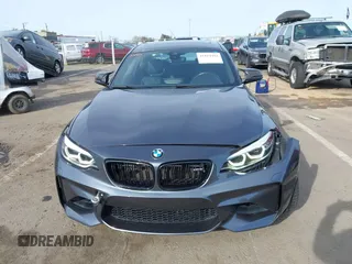 2018 BMW M2 with VIN WBS1J5C50JVE51869, listed as a IAAI auction lot 41814404 with 69,684 mi miles. Bid and sale history available at carsss.com. Image 12.
