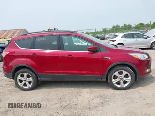 2016 Ford Escape SE z VIN 1FMCU9GX6GUB29495, wystawiony jako IAAI lot #42406964 z przebiegiem 103 892 mil mil oraz . Historia ofert i sprzedaży dostępna na DreamBid. Obrazek 12.