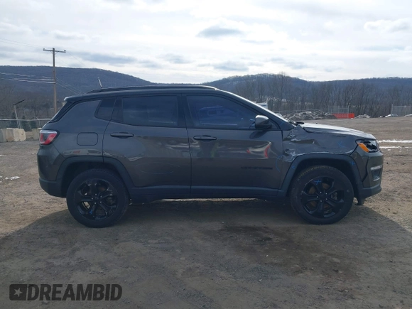 2019 Jeep Compass Latitude with VIN 3C4NJDBB4KT593022, listed as a IAAI auction lot 41627841 with 69,443 mi miles and . Bid and sale history available at DreamBid. Image 13.