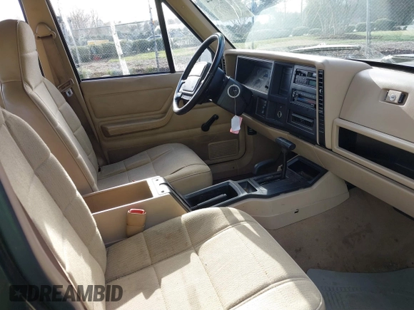 1996 Jeep Cherokee Sport with VIN 1J4FJ68S1TL204870, listed as a IAAI auction lot 41726962 with 93,462 mi miles. Bid and sale history available at carsss.com. Image 5.