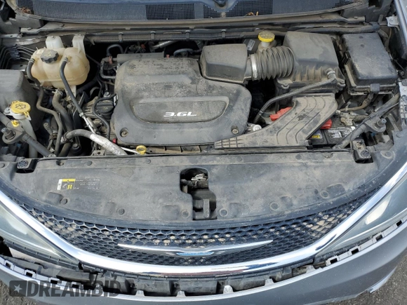 2018 Chrysler Pacifica Touring L z VIN 2C4RC1BG7JR311964, wystawiony jako Copart lot #54769725 z przebiegiem 105 062 mil mil oraz Szkoda całkowita • Salvage title. Historia ofert i sprzedaży dostępna na DreamBid. Obrazek 12.