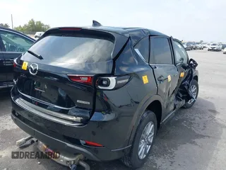 2024 Mazda CX-5 S Select with VIN JM3KFBBL1R0412779, listed as a IAAI auction lot 41932258 with Not Provided miles and . Bid and sale history available at DreamBid. Image 4.