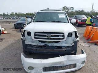 2004 Toyota Sequoia Limited with VIN 5TDZT38A04S236082, listed as a IAAI auction lot 41598592 with 104,042 mi miles. Bid and sale history available at carsss.com. Image 13.