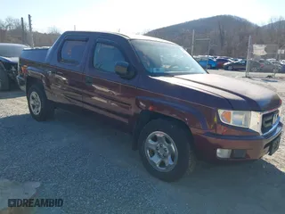 2011 Honda Ridgeline RT with VIN 5FPYK1F2XBB002135, listed as a IAAI auction lot 41734058 with 134,210 mi miles. Bid and sale history available at carsss.com. Image 1.