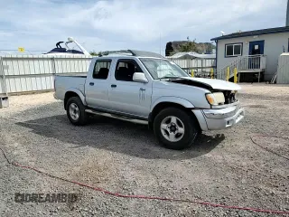 2000 Nissan Frontier XE with VIN 1N6ED27T8YC367452, listed as a Copart auction lot 55866345 with 242,945 mi miles and Salvage title. Bid and sale history available at DreamBid. Image 13.