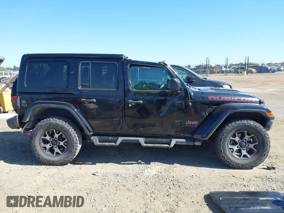 2018 Jeep Wrangler Unlimited Rubicon with VIN 1C4HJXFGXJW255881, listed as a IAAI auction lot 42316499 with 39,439 mi miles and . Bid and sale history available at DreamBid. Image 14.