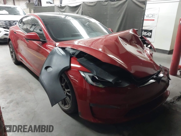 2022 Tesla Model S Plaid z VIN 5YJSA1E61NF471785, wystawiony jako IAAI lot #42208101 z przebiegiem Nie podano mil oraz . Historia ofert i sprzedaży dostępna na DreamBid. Obrazek 1.