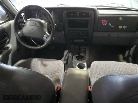 1997 Jeep Cherokee Sport with VIN 1J4FJ68S4VL532609, listed as a Copart auction lot 46711285 with 273,930 mi miles and Salvage Title. Bid and sale history available at carsss.com. Image 8.