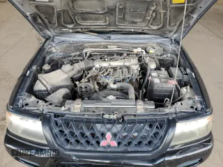 2001 Mitsubishi Montero ES z VIN JA4LS21H11P003533, wystawiony jako Copart lot #54403045 z przebiegiem 241 477 mil mil oraz Szkoda całkowita • Salvage title. Historia ofert i sprzedaży dostępna na DreamBid. Obrazek 11.
