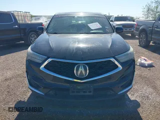 2021 Acura RDX Technology with VIN 5J8TC1H53ML001319, listed as a IAAI auction lot 41972431 with 89,698 mi miles and . Bid and sale history available at DreamBid. Image 6.