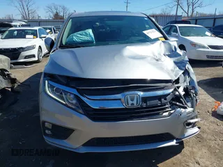 2018 Honda Odyssey EX-L with VIN 5FNRL6H71JB077112, listed as a IAAI auction lot 41721523 with 70,893 mi miles. Bid and sale history available at carsss.com. Image 12.