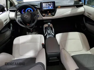 2021 Toyota Corolla Hybrid LE with VIN JTDEAMDE0MJ009233, listed as a Copart auction lot 78416684 with 212,244 mi miles and Clean Title. Bid and sale history available at carsss.com. Image 8.