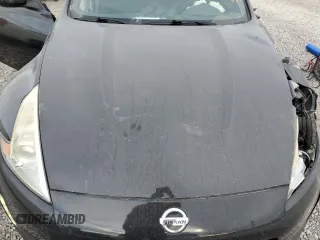 2014 Nissan 370Z Touring with VIN JN1AZ4FHXEM621358, listed as a Copart auction lot 84832164 with 65,441 mi miles and Salvage Title. Bid and sale history available at DreamBid. Image 11.