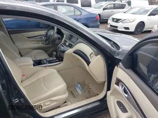 2013 Infiniti M37 with VIN JN1BY1AP9DM513719, listed as a IAAI auction lot 41543165 with 141,488 mi miles. Bid and sale history available at carsss.com. Image 5.