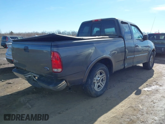 2003 Ford F-150 XL with VIN 1FTRX17W53NB00671, listed as a IAAI auction lot 41576739 with 194,066 mi miles. Bid and sale history available at carsss.com. Image 4.