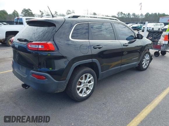2014 Jeep Cherokee Latitude with VIN 1C4PJLCB0EW288309, listed as a IAAI auction lot 41624746 with 164,037 mi miles and . Bid and sale history available at DreamBid. Image 4.