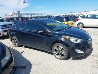 2014 Hyundai Elantra z VIN KMHDH6AH0EU026286, wystawiony jako IAAI lot #42458936 z przebiegiem 168 755 mil mil oraz . Historia ofert i sprzedaży dostępna na DreamBid. Obrazek 1.