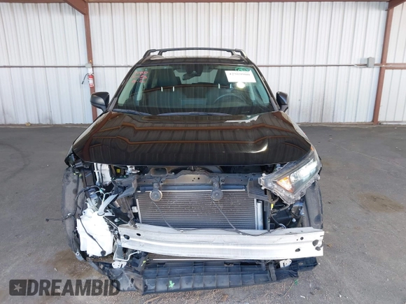 2021 Toyota RAV4 LE with VIN 2T3F1RFV1MC195589, listed as a IAAI auction lot 42509900 with 61,671 mi miles and . Bid and sale history available at DreamBid. Image 13.