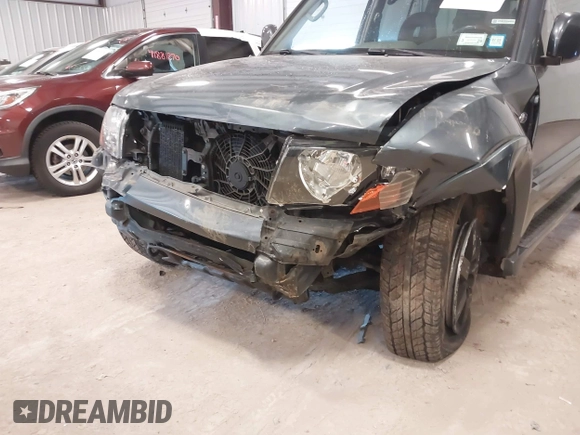 2005 Mitsubishi Montero Limited z VIN JA4MW51S05J000427, wystawiony jako IAAI lot #41866896 z przebiegiem 158 494 mil mil oraz . Historia ofert i sprzedaży dostępna na DreamBid. Obrazek 6.