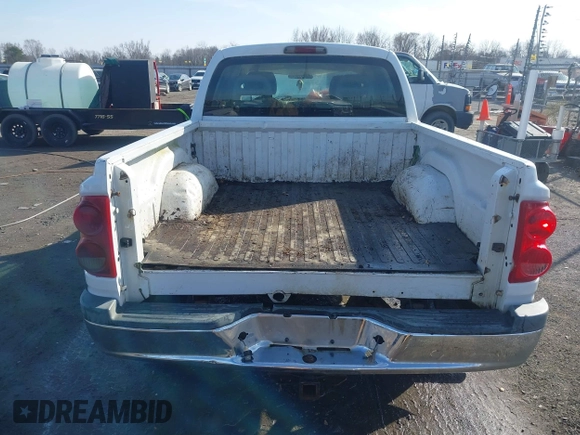 2005 Dodge Dakota SLT with VIN 1D7HW48N85S226460, listed as a IAAI auction lot 41568128 with 213,159 mi miles and . Bid and sale history available at carsss.com. Image 20.
