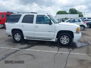 2005 GMC Yukon Denali z VIN 1GKEK63U55J259803, wystawiony jako IAAI lot #42126835 z przebiegiem 199 762 mil mil oraz . Historia ofert i sprzedaży dostępna na DreamBid. Obrazek 13.