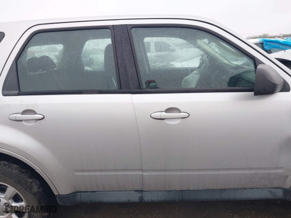 2011 Mazda Tribute Sport with VIN 4F2CY9C7XBKM01050, listed as a IAAI auction lot 41433870 with 122,287 mi miles. Bid and sale history available at carsss.com. Image 13.