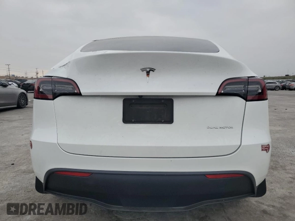 2023 Tesla Model Y Long Range with VIN 7SAYGDEE2PF860135, listed as a Copart auction lot 50380975 with 25,334 mi miles and Salvage Title. Bid and sale history available at DreamBid. Image 6.